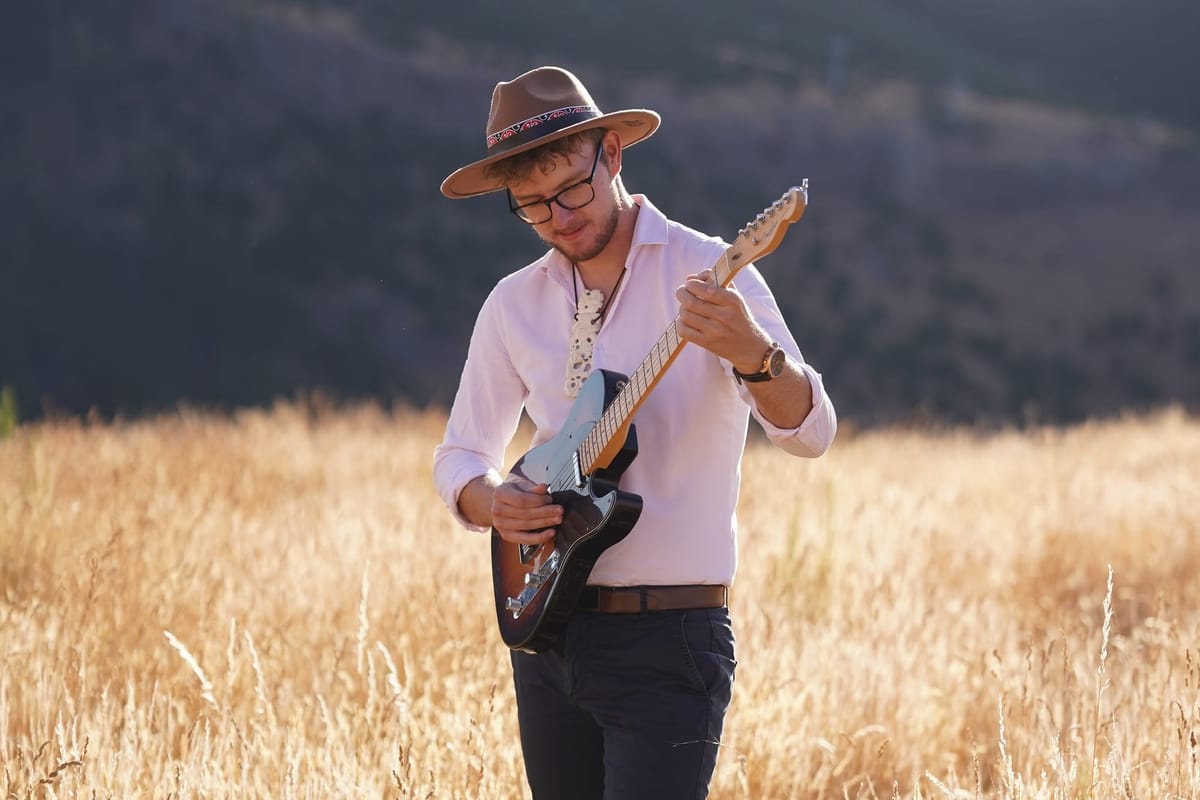 Josh Keating puts te reo Māori at the heart of country pop on ‘Again’